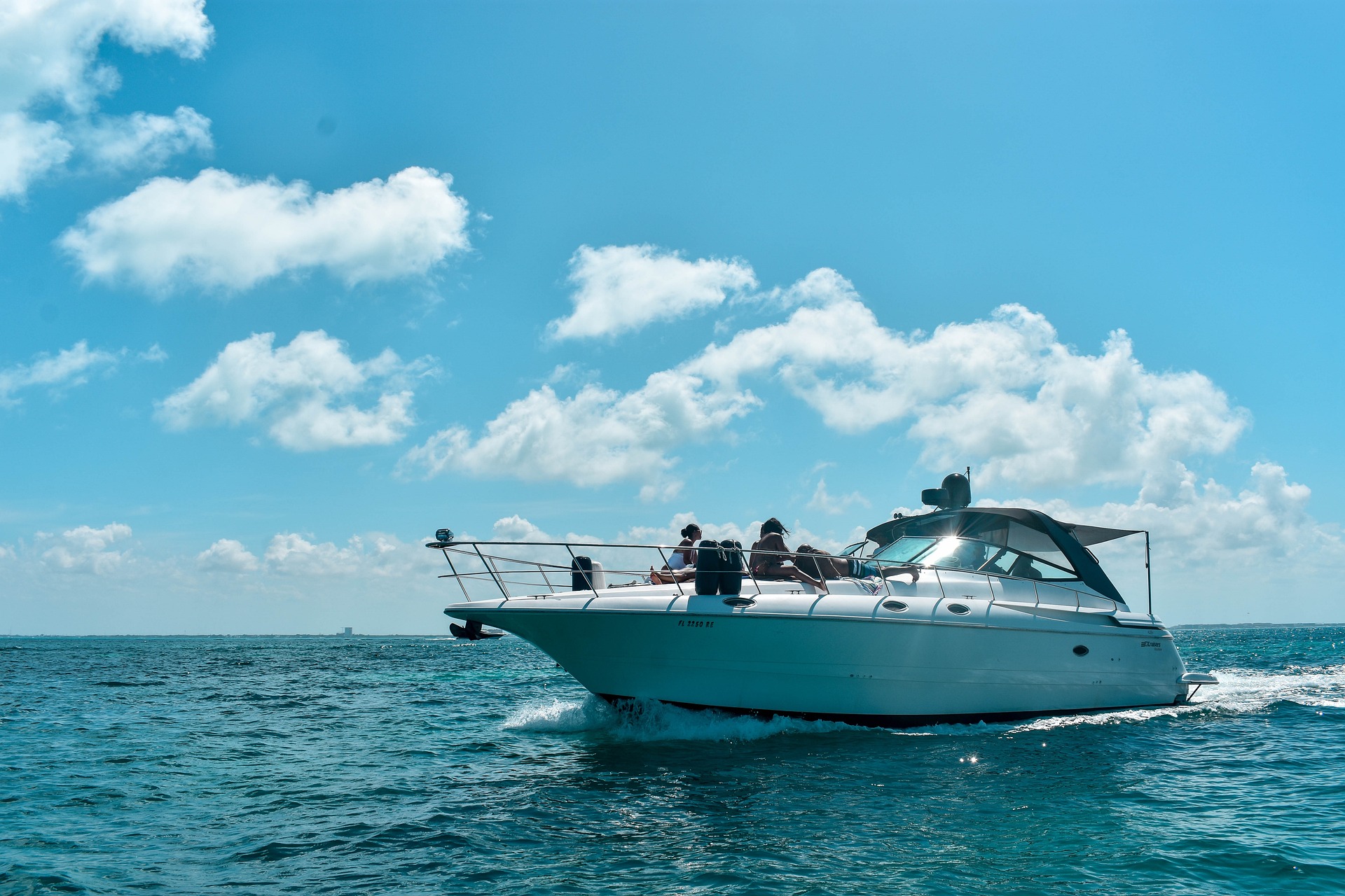 Yacht cruising on the open ocean in Miami